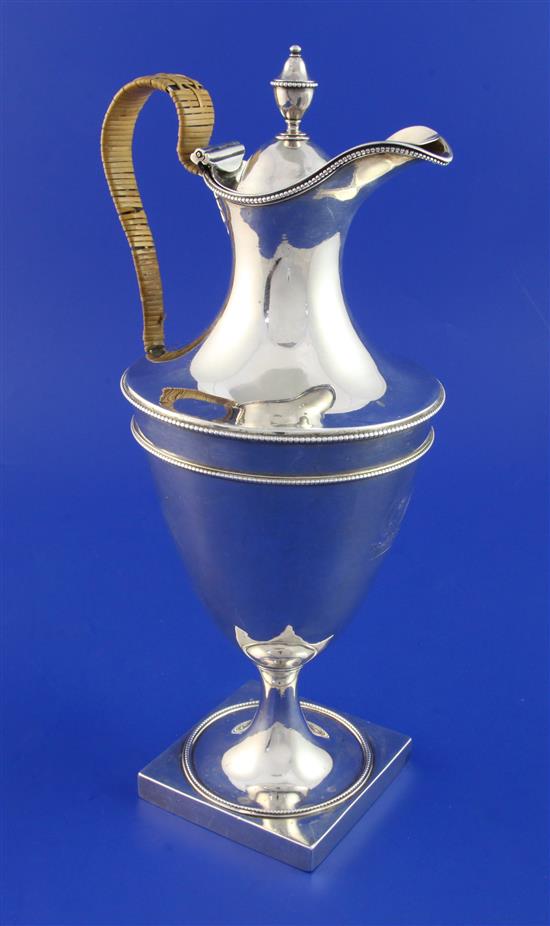 A George III silver Adam style hot water jug, gross 22.5 oz.